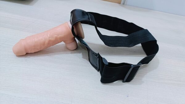 Premium personal wellness massager black color ergonomic design Close-up view of luxury body massager device